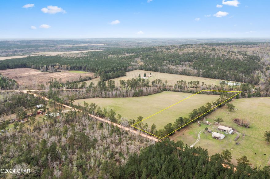 Embrace the allure of nature on this sprawling 6.464+/- acre canvas of potential. Situated in a tranquil setting, this vacant land offers a blank slate for your vision to flourish. Whether you're envisioning a custom-built home or recreational haven, the possibilities are limitless. Surrounded by scenic landscapes and enveloped in tranquility, this property invites you to create your own sanctuary.  Additional adjoining acreage can be purchased.