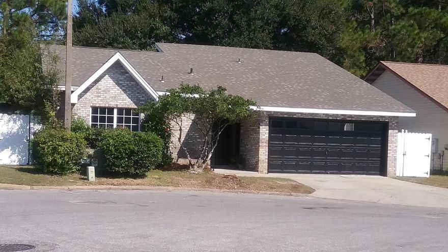 OPEN HOUSE SUNDAY DEC 3rd 1-3 PM . Northshore AREA BRICK CONTEMPORARY complete with modern updates and upscale finishes. Tucked into a quiet cul de sac it's still an easy drive to everything! A STUNNING OPEN FLOOR PLAN with high ceilings and hand scraped plank flooring make this home live large. The kitchen and dining area open up to the family room,creating a great flow for entertaining. A spacious GRANITE BAR provides loads of counter space. NEW CUSTOM CRAFTSMAN-STYLE WHITE CABINETRY and BLACK STAINLESS APPLIANCES add both function and style! The exterior features a NEW ROOF, a 2 car garage and fenced yard with a canal view. Don't miss this one!