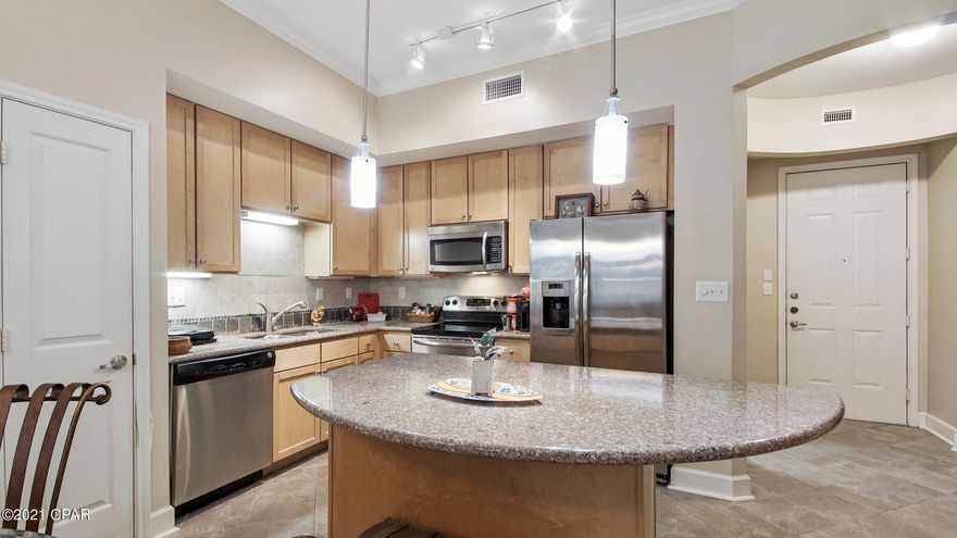 Looking for an AFFORDABLE, MOVE IN READY, condo on Panama City Beach? This is it! The Island Reserve community is located within minutes of the white sandy beaches and PCB's best restaurants & attractions. Even better, this units location! Unit 2107 is a wonderfully private, ground floor, end unit overlooking a garden (with fountain views from the bedroom) and is just steps from the clubhouse! At the clubhouse you have full access to a movie room, basketball court, volleyball court, a massive fitness center, and a 1 acre pool with grottos & waterfalls! Don't be fooled by the size! This specific floor plan boasts 10 ft ceilings, can sleep six people comfortably if the bunk room is utilized, and allows for two parking spaces in the garage year round.