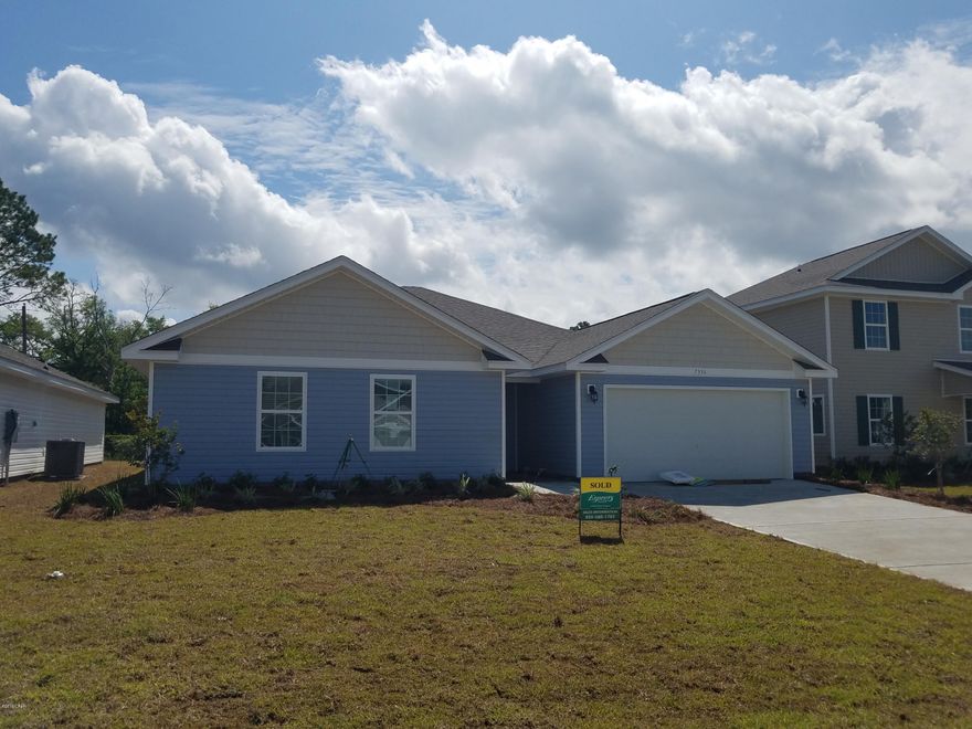 Turn-key new construction 4 bedroom, 2 bath home in the Port Place neighborhood located just off Hwy 77 in Southport. The home features expansive living space with its open floor plan concept and durable vinyl flooring that looks like wood. The living room overlooks the back yard and is open to the kitchen ideal for entertaining. There is a fully equipped kitchen with refrigerator, stove, oven, dishwasher, microwave. Plenty of cabinet and counter space with a pantry closet for added storage. Attached is a breakfast nook or formal dining area that leads to the back yard.     The master bedroom also overlooks the back yard and will easily accommodate a large king size bedroom suite. The en suite bathroom offers double vanities, walk-in shower with built-in shelving and separate soaking tub. There is a huge master closet attached to the bathroom. The split bedroom plan has the other three bedrooms and bathroom on the other side of the home. All bedrooms have new carpet; Laundry room with washer/dryer included! NO PETS!