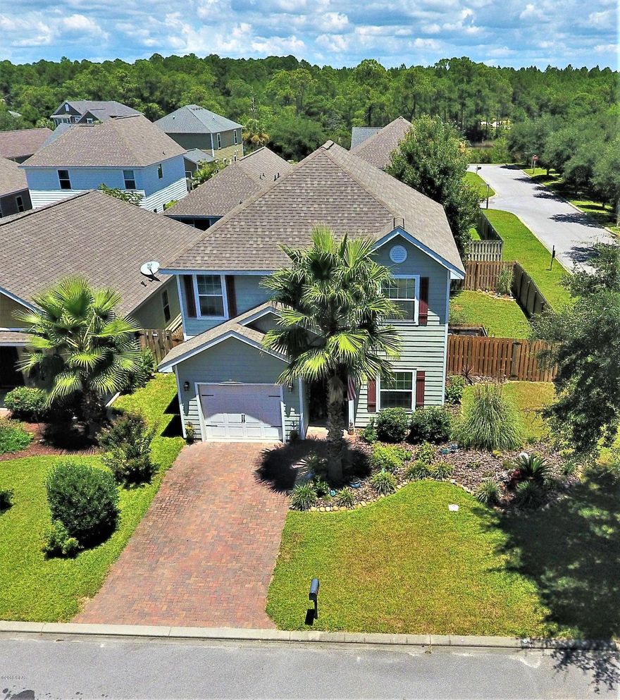 Turtle Cove at Lake Powell, West End of PCB, minutes from the Gulf of Mexico, Pier Park and 30A. Featuring a 4 bedroom home with 3.5 bathrooms, garage, privacy fenced backyard and bonus room / loft / living area! The community has a clubhouse, workout room, pool, tennis courts, dock on Lake Powell and green areas for kids, dogs, families and an amphitheater. Home is ready today and pet friendly! Come Tour ASAP!