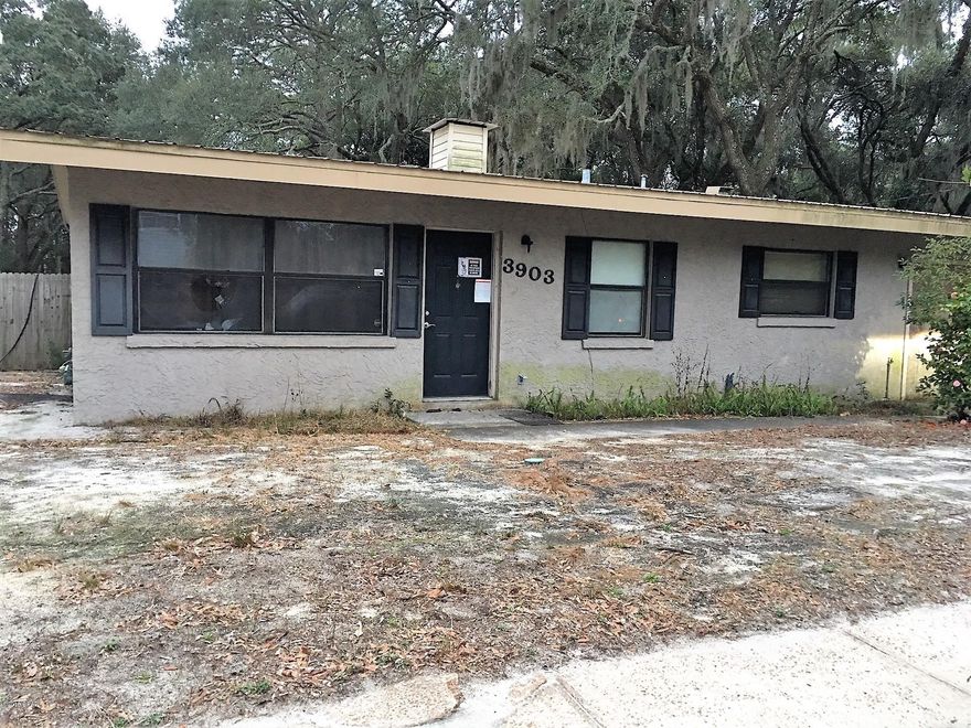 This house sits on a acre lot with an extra building in back.  It has a metal roof, granite counter tops and new kitchen cabinets. If you put a closet in the bonus room, it could be used as a 3rd bedroom.  Mainly needs to be cleaned up. Good first time home owners or rental.  If measurements are important, please measure.