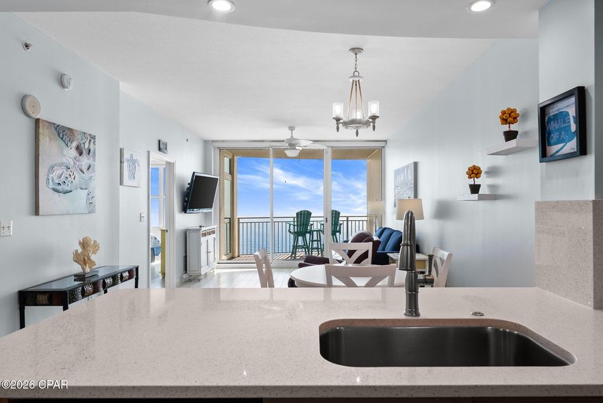 Here is your opportunity to own one of the nicest 1BR condos at Aqua, the most upscale resort in PCB.  This rare 1BR floorplan has the master suite on the Gulf with separate door access to the balcony, 2 full bathrooms, and a separate bunkroom. After purchasing this condo 6 years ago, the owner has invested over $50K remodeling this condo as their primary residence. Upgrades include high-efficiency geothermal HVAC, oversized water heater, Bosch dishwasher, dual bottom drawer refrigerator, stove with oven never used, wood-tile look porcelain throughout, quartz countertops, tiled master shower, new commercial grade sleeper sofa with Sunbrella fabric, leather recliner, twin bunk beds w/Jamison mattresses, Levolor power blinds, and much more (full report is available).     
The condo has a large wall-mounted flat screen TV in the living room, larger washer and dryer with sensor control, and long-lasting polywood balcony table and chairs.
Don't miss out on this opportunity to make this special condo your new 1st/2nd home or vacation rental property.


The condo has tile throughout the main living areas and bathrooms. The kitchen features a new single-level quartz countertop, stainless steel appliances and a pantry.  This unit also features a full-size/front loading washer and dryer and a lockable owner's closet

And of course, the Aqua Resort is ideally located directly across the street from the new Top Golf, only a few hundred yards from Pier Park, and also close to the new Dolly Parton Pirates Voyage Dinner Theatre.