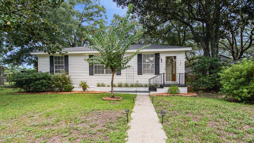 Welcome to your new home! This delightful well-maintained cottage-style residence offers a cozy and inviting atmosphere with modern updates and convenient amenities, making it the perfect choice for comfortable living in Niceville. The home features three bedrooms and one bathroom. The kitchen is recently updated with newer appliances, and the HVAC system, installed in 2021 ensures year-round comfort.

Step outside to enjoy the large deck, perfect for entertaining or relax in a separate area with an additional concrete patio and firepit and take advantage of the large, detached garage with concrete driveway and quaint outbuilding suitable for storage, crafting, artist's studio, man cave or she-shed. The fenced-in yard, adorned with mature trees, provides both privacy and a serene outdoor space.  The house and garage both have new roofs with enhanced underlayment, installed in July 2024.

Located within walking distance to Ruckel Middle School, Niceville High School, and the Niceville Public Library and Children's Park, this home is ideally situated for families. Northwest Florida State College is just approximately 1.5 miles away, while Eglin Air Force Base is about 8.5 miles from your doorstep. Additionally, you'll enjoy close proximity to the beautiful beaches, diverse restaurants, and shopping options in Destin, offering a perfect balance of relaxation and convenience.