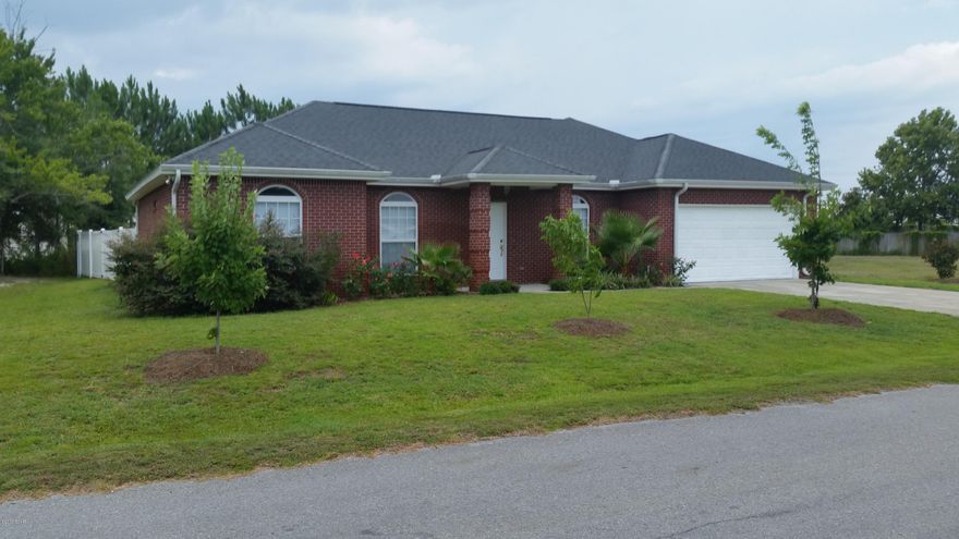 Like new  4 bedroom, 2 bath Brick home located in Parker. Home features large Great room, with with new wood floors, well equipped kitchen,split bedroom floor plan, master suite has large closet and bath featuring separate shower and Jacuzzi tub, eat in kitchen, dining room with wood floors. outside features sprinkler system, new vinyl fencing, storage building for your lawn equipment.  Very close to shopping and Tyndall.