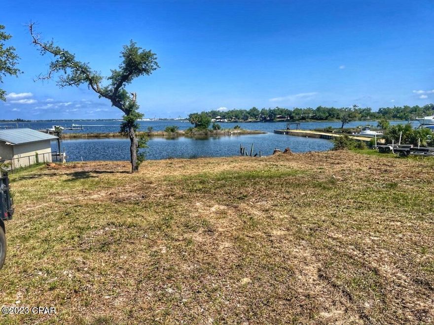 *CURRENTLY UNDER CONTRACT, SELLER ACCEPTING BACKUP OFFERS*. Imagine waking up every day to stunning views of the East Bay from your very own waterfront home! This vacant parcel is just waiting for you to build the home of your dreams, with a backyard oasis. The property has recently been cleared giving you the chance to design your dream home without any obstacles.  Plus, with fast and easy access to Tyndall Air Force Base and Highway 98, you'll have the best of both worlds - convenience and serenity. So why wait? Don't miss out on this amazing opportunity to build your dream home in a location that's truly one-of-a-kind.