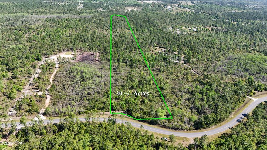 More photos to be added. 20 Acres of Vacant, uncleared land. Would make a great site for homesteading or possibly for a small hunting location. The area is growing and this acreage is located on a paved road just 20 min to Marianna or the interstate.