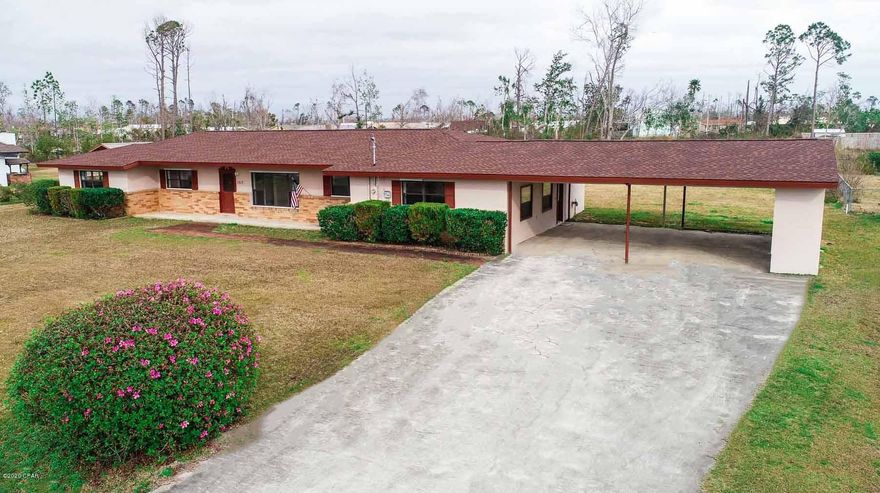 Renovated 4 bedrooms 3 bath home situated on 1 acre of land 10 minutes to Tyndall AFB, Eastern Shipbuilding and the Paper Mill. Close to shopping, restaurants, and recreational activities. This home has been renovated from the studs, new roof almost new A/C units, all new ductwork. This home boasts a country kitchen with custom cabinets, granite, countertops and new stainless appliances. Home has tile in all where areas, and carpet only in the bedrooms. Home has new lighting and fans throughout. All new doors and hardware. Insulation is more than code required. It has a large rec room, that could double as a 5th bedroom. Large utility room with lots of potentials. Large back yard, lots of room for a pool or a garden. Includes a spacious workshop. Need lots of room, call today.