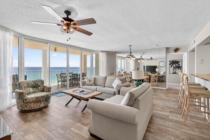 **PRIME LOCATION IN TOWER III** Located at Long Beach Resort Tower 3, this 3BR/3BA gulf-front condo sits directly on the beach in one of the most established resort communities in Panama City Beach. The building is almost finished with a full resort refresh, including extensive exterior restoration, waterproofing, balcony upgrades, and pool enhancements - elevating both appearance and long-term value across the community.

This is a true beachfront floor plan designed around the views. All three bedrooms are positioned on the gulf side, each with balcony access and floor-to-ceiling glass that fills the space with natural light and keeps the water as the focal point throughout the residence. As an end unit, it benefits from added privacy, expanded light, and enhanced views.

The open-concept living and dining area is exceptionally spacious for a condo, creating a comfortable central gathering space that flows directly to the gulf-front balcony. The kitchen features stainless steel appliances, ample cabinetry, and a long breakfast bar that extends the living space for casual dining and entertaining.

Tile flooring runs throughout the main living areas, with carpet in the bedrooms for comfort. Sleeping arrangements are ideal for larger groups, offering two king bedrooms, a third bedroom with two queen beds, and a queen sleeper sofa in the living area - comfortably accommodating up to 10 guests. A separate laundry room with additional storage adds practical convenience.

Ownership at Long Beach Resort includes access to a 7,500 sq ft lagoon-style pool, two heated Polynesian-style pools, three hot tubs, beachfront tiki bar, fitness center, BBQ grilling areas, secure private beach access, 24/7 gated security, and lush tropical landscaping throughout the grounds.

Set directly on the gulf within walking distance to Panama City Beach's most popular dining, shopping, and attractions, this residence brings together expansive beach views, resort-style amenities, and an unbeatable beachfront location.

Offered for those looking for a fully furnished gulf-front opportunity - schedule your private showing!