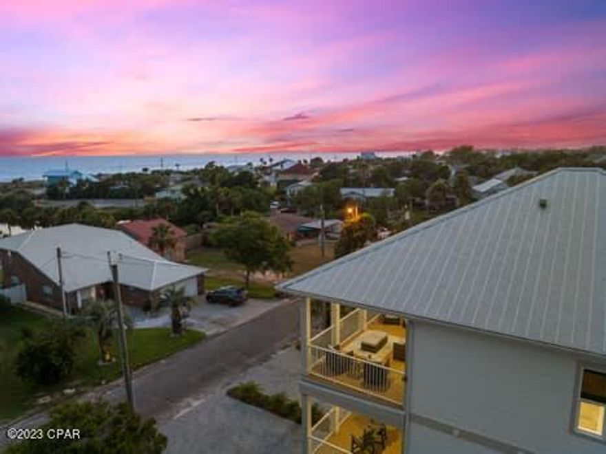 Priced below current appraisal!  Will divide and sell the west side separate.  
This Brand New Construction duplex with professional interior designs provides relaxing and charming ambience located a block from Beach Access 84 and 5 miles to extraordinary 30A with matching floor plans on each side. You can live in one side and either offer the other side as a short term vacation rental or long term rental. Both have individual fenced-in private natural gas heated pools complete with pergolas and outside showers. 
Rent both sides with a short term rental projection of 
up to $336,400-$368,600! 

Enter the first floor into a welcoming, attractive entryway.  Bedroom #1 has two double beds over two Queen beds and private full bath with tub and shower.  A laundry room and owner's closet are located in the hallway. This first level bedroom #2 has a pool view with King size bed, walk-in closet, custom wall murals with private en suite to include a full bath with shower. The bath provides a convenient entry door with access directly onto the pool area.

This 2nd master bedroom contains a large closet, murals and master bath with rain shower and double vanity.  Double doors open onto a covered porch with gulf views.  The 3rd  master bedroom has a large walk-in closet, custom murals and full bath with shower. The second floor also contains a bonus ''Zoom Room'' with single bed and work desk.
Enter the third floor into an inviting open Dining, Kitchen and Family room.  Stainless steel appliances include a built-in microwave, refrigerator-freezer, gas stove, electric oven and dishwasher.  The shiplapped dining area provides seating for ten along with a beautiful island complete with seating for four.  Double glass doors exit the kitchen providing a stunning panoramic gulf view opening onto a covered porch with a stainless steel natural gas grill.  The third floor family area overlooks the pool.
The home is equipped with an inside sprinkler system along with fire and carbon dioxide alarms and elevators that provide easy assess to the upper floors.
If you are searching for a home with a ''don't want to leave'' feeling for you, your family or guests this is the place!  
The west side of the duplex is available to be bought separately.
It is the responsibility of the buyer to verify all measurements.