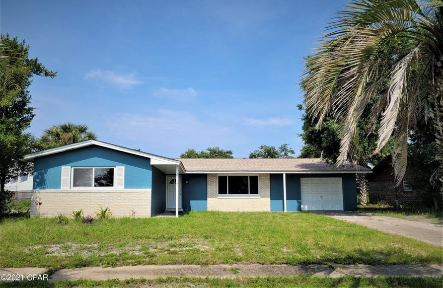 Beautiful home located near the Navy Base and the World's Most Beautiful Beaches!  Only 2 miles to the nearest beach! This home is well maintained and updated with many items new or nearly new since the Hurricane...water heater, roof and stove just to name a few.  The home features custom tiled flooring with carpeted bedrooms, remodeled kitchen and guest bathroom, updated power boxes and light fixtures.  A screened porch provides quiet relaxation ...  Located in a quiet neighborhood and just minutes from St Andrews Park!  Call you favorite Realtor today for a private showing!