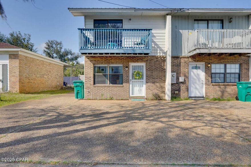 Beautiful townhome that is move-in ready! This property is turnkey. There is no HOA and will be great primary home or add it to your rental portfolio as a short or long term rental. This home is a 2-bedroom, 2.5-bath.  The living room, kitchen and dining area, plus the laundry room and a half bath on first floor. The kitchen is updated with stainless steel appliances, granite countertops, and tile backsplash. Tile flooring throughout the downstairs. Upstairs, you will find two generous bedrooms, each with private full bathroom. The master suite also features a balcony with a waterview of Pitts Bayou. 
The backyard is U-shaped. It is very spacious and has a detached garage, open patio, and is fenced. It is nicely landscaped and is ideal entertaining & relaxing. Create your own private outdoor oasis. The furniture & other household furnishings are not included with the sale, but can be purchased separately. This home is conveniently located near Tyndall Air Force Base, Mexico Beach, shopping, schools, parks, boat ramps, Panama City beach, and much more! Don't miss out on this opportunity, come view today!
