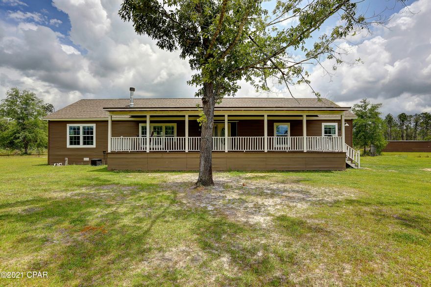 Don't miss out on this wonderful opportunity to become the new owner of this slice of paradise. This property consists of two separate 5 acre parcels with multiple outbuildings and each parcel has a home on it. PID 00649-010-000 Has the 3/2 Modular Home and PID 00649-000-000 Has a 3/2 Singlewide Mobile Home and Large Horse Barn. The possibilities are endless with this beautiful property. The spacious, split and open floor plan of the modular home offers plenty of room to both live and entertain. The Master Bedroom offers space for oversized furniture and leads to the beautiful master bathroom that features a large shower, separate bathtub, double vanity and walk in closet. The kitchen offers lots of cabinet and counter space and features a large island. The living room features a stone, Wood burning fire place with built in book cases on either side. From the laundry room, to the spare bedrooms and guest bathroom, this home does not lack utility or space. The covered front porch and large pond are just an added bonus! The single wide also offers plenty of space with a split floor plan that consists of 3 bedrooms and 2 bathrooms. This could be used for rental income, an office, mother-in-law suite or much more. The large horse barn consists of multiple stables and ample storage areas for your toys and equipment. Don't limit yourself to just seeing pictures of this property, call a Realtor today to schedule your private showing. The possibilities are endless.

If important, please verify all measurements.

Seller may consider selling each individual parcel.