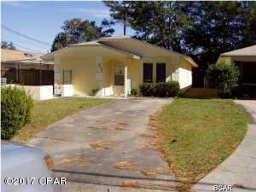 LYNN HAVEN HOME IN A GREAT LOCATION!  This 2BR/2BA home features an open floor plan with a large Great room and eat-in kitchen.  The Master bedroom with Master bath has a large walk-in closet and an exterior door to a wooden deck and fenced backyard.  The laundry closet is conveniently located in the hall outside both bedrooms and next to the guest bath, and a large covered patio with an additional storage room can be accessed from the kitchen.  This home is in walking distance to post office, shopping and restaurants!  And, at this price, you can buy for less than rent!