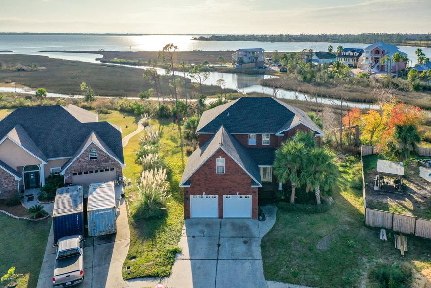 CURRENTLY UNDER CONTRACT, SELLER ACCEPTING BACKUP OFFERS 

WATERFRONT! If you have been waiting for an affordable waterfront home that doesn't require a total overhaul CHECK THIS OUT. This is an ALL BRICK, 4 bedroom, 2.5 bath, home with a HUGE BONUS ROOM,  TONS OF STORAGE, a BRAND NEW ROOF, a GREAT FLOOR PLAN, and endless possibilities. There is so much space and storage throughout this home that you can literally have a place for everything.  If the floor plan and storage in this home doesn't make you fall in love the views from the 44 ft back patio will. The patio can be accessed from the master, the living room, and the breakfast area. Enjoy a cup of coffee and watch the sunrise or Grab your kayaks and paddle boards and take a stroll around the bayou after work. Downstairs you will find a gorgeous kitchen with a breakfast area, beautiful high quality wood cabinets, a large pantry, plus a large formal dining area that could easily be transformed in to a home office/study/kids play area/hobby room/ or formal sitting room.  The eat in area and living area are lined with large glass windows and doors overlooking the water. There is a half bath for guests as well as the master bedroom that also offers tons of natural light, views of the water, and access to the back deck. Inside the master bathroom is a huge walk in closet. I mentioned this house has a ton of space. There is plenty of extra storage in both utility closets as well as under the stairs. Upstairs there is a huge bedroom that is separated from the other 2 bedrooms PLUS the 23x14 Bonus Room that is not even included in the heated and cooled sqft. This room would make a great hobby room/man cave/ or kids play area. With some minor work this could be your dream home. Call your Realtor today to see this great home.