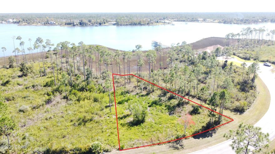 Amazing Waterfront in the desirable Laird Bayou. Best priced dock-able waterfront in the area. At over half an acre, there is plenty of space to build your Dream Home. Massive open water views across the bayou. Excellent year-round water depths to accommodate large boats. No worries of low bridges or tides restricting your access. Laird Bayou is a gated waterfront community with ribbon curbed streets and underground utilities. Amenities include a boat launch, pool, and rv/boat storage. Just seconds to East Bay and a short ride to the Gulf of Mexico. Great proximity to TAFB, restaurants and shopping.