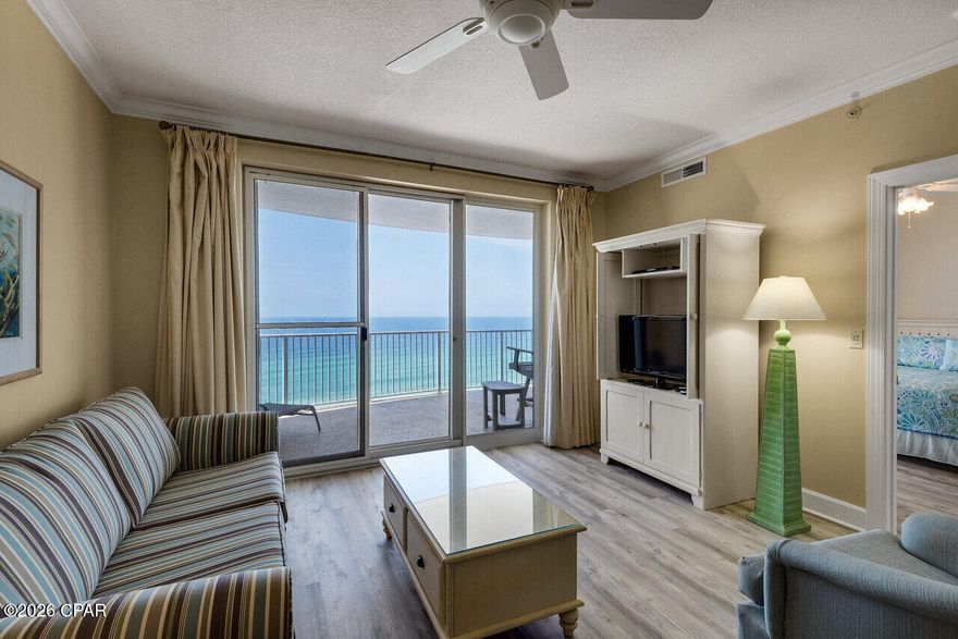 Gorgeous Beachfront 2-Bedroom Condo at Ocean Villa.

Experience the pinnacle of coastal elegance in this stunning 2-bedroom condo at Ocean Villa, located right on the pristine shores of Panama City Beach. Featuring one of the most spacious balconies offered in a two-bedroom layout, this residence delivers spectacular Gulf views, perfect for enjoying your sunrise coffee or relaxing to mesmerizing evening sunsets.

Inside, an inviting open-concept design welcomes both quick weekend escapes and longer stays alike. The beautifully appointed interior showcases smooth tile flooring throughout, delivering a fresh, contemporary feel. The sophisticated kitchen shines with sleek granite countertops, marrying style with everyday practicality. A handy owner's storage closet right outside the door adds extra convenience.

Currently part of a proven short-term rental program. Ocean Villa spoils residents with outstanding amenities: two sparkling pools (including an outdoor pool and a seasonally heated indoor option), a generous hot tub, and a vibrant grilling pavilion. Keep fit or unwind in the well-equipped fitness center, which includes a sauna and steam room.

Convenience and security come standard, thanks to a covered walkover that safely connects to a three-story parking deck across the street. Extra parking is also available in the two-story garage on the south side of Front Beach Road, directly under the building.

Seize the opportunity to claim this move-in-ready beachfront gem, where luxury meets effortless coastal living.