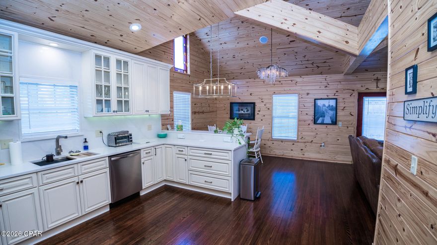 Welcome to this one-of-a-kind custom home on a huge half-acre lot in the heart of historic Panama City. This gorgeous home will surprise you with it's superb craftsmanship and luxury materials, along with unique details you have to see to believe. Classic style with newly refinished wood floors, and all new interior tongue and groove pine walls, with cathedral ceilings. 

Two large master suites are each complimented by cozy gas fireplaces, walk-in closets, and custom bathrooms with tiled showers. Each have private entrances for accessibility, or future rental capabilities. An additional guest bedroom has access to the 3rd bathroom, conveniently located right off the kitchen. 

The open living area with new kitchen will impress when entertaining, with sleek quartz countertops and high end kitchen cabinetry. New stainless appliances and under-cabinet lighting provide the finishing touches to this gorgeous kitchen. Modern amenities include Built-in deluxe speakers throughout the home, as well as security and Nest systems that convey.

Giant yard is high and dry, with room to store ALL your toys. A large covered porch is your key to a shady afternoon retreat, entertaining guests, or enjoying a relaxing rain shower. 

Located within minutes to revitalized and booming downtown Panama City, with dozens of restaurants,  shops, night spots, and activities. The area is abundant with parks, boating, fishing, events, and ongoing improvements to the area. Whether looking for your next home, or investing in the future of Panama City, this property has room to add additional dwelling units, pool, parking, outbuildings, and so much more! With Mixed-Use Zoning, there are options for commercial use, live-work situations, and so much more! Also offered as a commercial lease. 

An additional concrete patio was prepared, but not yet finished. See pictures for similar design. Alterations to the home can be negotiated. All appliances, including HVAC and Water Heaters, are within 3 years old and warrantied. This entire home has been remodeled by quality contractors and is like new, with some original touches kept for historic and aesthetic value. Furnishings are negotiable.