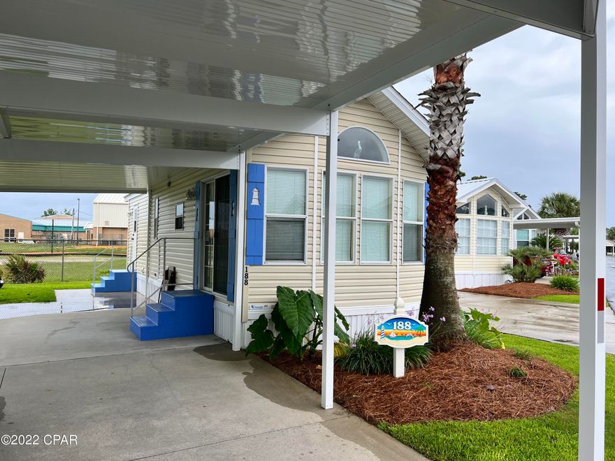 Are you looking for a move-in ready home located in Emerald Pointe Resort, one of the highly sought-after communities in Panama City Beach? Look no further! This one bedroom, one bath home has been beautifully updated and is being sold fully furnished and move in ready. Recent updates include: Roof 2019, carport 2021, Patio cover 2022, Stove and Washing Machine 2021, Hot Water Heater 2019, LVP Flooring throughout the home, and a freshly painted interior. This home would be an excellent primary residence, vacation home or rental property. Emerald Pointe Resort is a gated community located in the heart of Panama City Beach. 

Emerald Pointe Resort is a gated community located in the heart of Panama City Beach close to restaurants, shopping, and the world's most beautiful beaches. (Cont...) It's a golf cart friendly community that offers a large clubhouse, exercise room, 2 pools (one heated seasonally), hot tub, private lake w/boardwalk and shuffleboard courts. HOA Includes: Water, Sewer, Garbage, Cable TV, and Lawn Service. All information is approximate and should be verified by buyer if important.