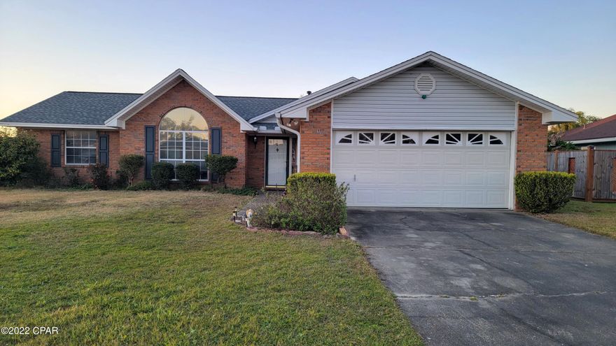 Well maintained home (original owner) near Tyndall AFB, shopping, etc.   This home suffered very minor damage from Hurricane Michael, but received a new roof, and new indoor/outdoor carpet in the heated and cooled sunroom.  This home has a spacious living room and nicely sized bedrooms,  The kitchen is just off the living area, and straight in from the garage so it's convenient for unloading.  Large lot with fenced back yard and a beautiful pond next door with walking area and benches.