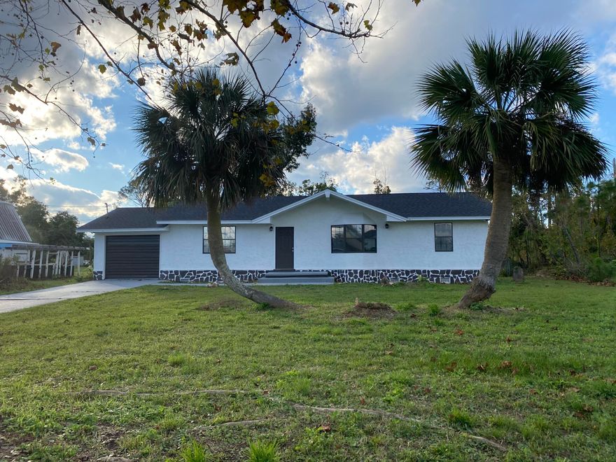 Completely remodeled 3 bedroom 2 baths home close to everything. The big bay window in the living room adds tons of natural light. large laundry room/pantry off the kitchen. New roof, appliances, LVP flooring throughout the home, relaxing back deck.