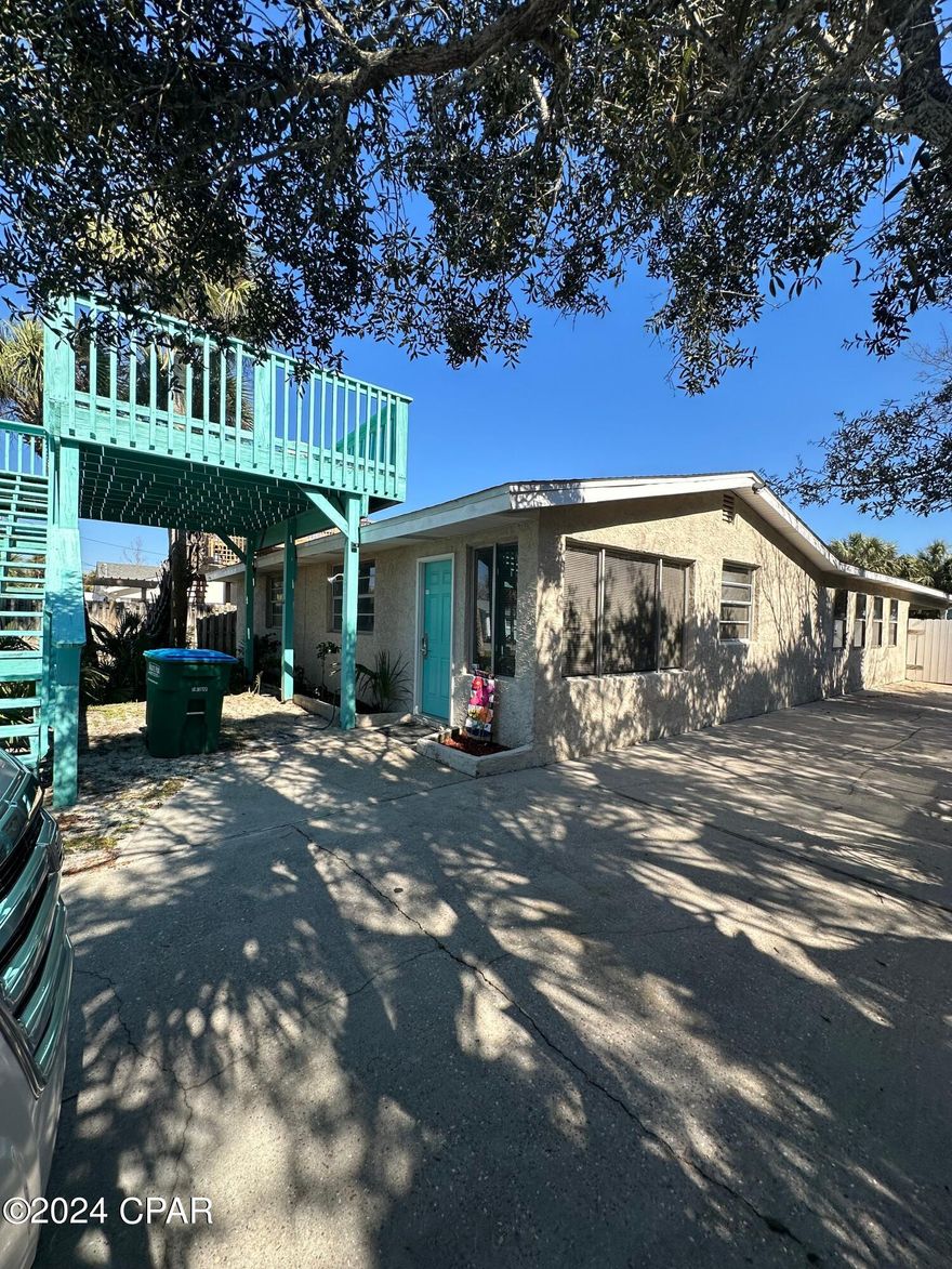 4 bedroom 2 bath FURNISHED Bid A Wee home. You are steps from the sandy beaches! Lawn care included. Private Bid A Wee Beach access. Enjoy views of the gulf from your private upper deck. Private parking in rear. Large low maintenance back yard.