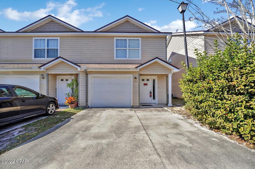 Under Contract, taking Back Up Offers! Awesome three bedroom, two and a half bath townhouse with an over-sized one car garage. Open floor plan with French doors to patio. Roof and water heater replaced 2019. No yard work! HOA takes care of yard maintenance. Stainless steel appliances, nice cabinets, and ample counter space in kitchen. Tile in living room, kitchen, and half bath. Half bath downstairs for guest and 2 full baths upstairs featuring tile and shower/tub combo.. This is a growing neighborhood just minutes from Tyndall Air Force Base and only minutes from downtown Panama City. Sizes approx, buyer should measure if important.