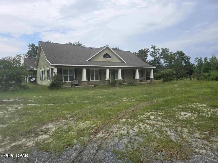 Bring this Craftsman Style Home back to its original Beauty. Home was built in 2007 and sits on almost 6 acres. The home features 10 ft ceilings with crown molding. 4 Bedroom, 2 Bath split floor plan. Living room has a wood burning fireplace. Front porch is covered and perfect for your Rocking chairs. 
Additional information on property is available. Call today for information.