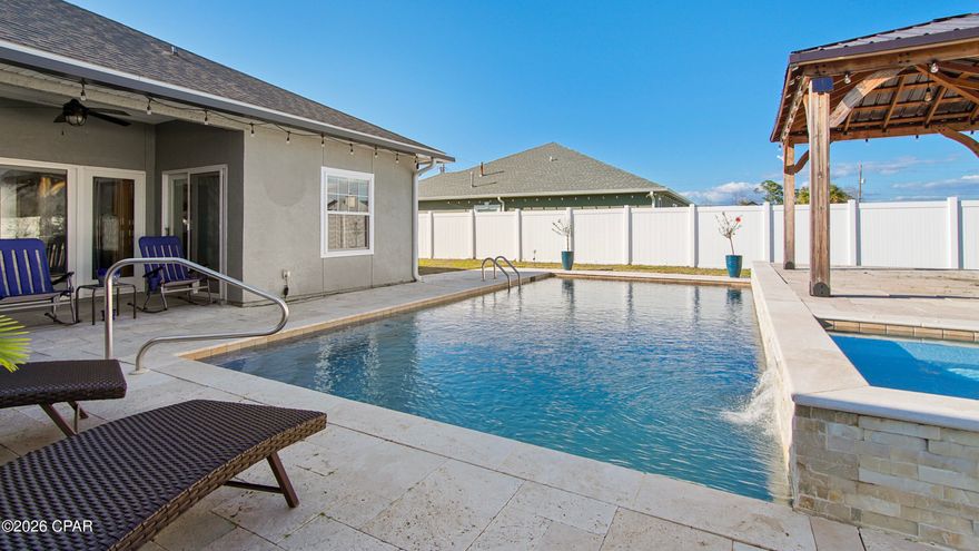 Welcome to this stunning 3-bedroom, 2-bath home perfectly situated in the heart of Lynn Haven. Designed with both comfort and functionality in mind, this home features a thoughtfully designed floor plan with guest bedrooms located on the opposite side of the home from the spacious primary suite, offering privacy for family and visitors alike.
Enjoy multiple living areas including two separate living spaces, a formal dining room, and a cozy breakfast area--ideal for both everyday living and entertaining. The main living room is warm and inviting, highlighted by a beautiful gas fireplace that creates the perfect focal point and cozy gathering space.
Step outside to your own private oasis. The fully fenced backyard offers exceptional privacy and features a breathtaking saltwater pool and relaxing hot tub perfect for enjoying Florida living year-round.
Inside, you'll find tile flooring throughout the main living areas, plush carpet in the bedrooms, custom cabinetry, and beautiful granite countertops that elevate the kitchen and baths.
Conveniently located close to shopping, grocery stores, parks, and restaurants, this home offers both tranquility and easy access to everyday essentials.
This home truly combines comfort, style, location, and functionality in a highly desirable area. Don't miss your opportunity to make it yours!