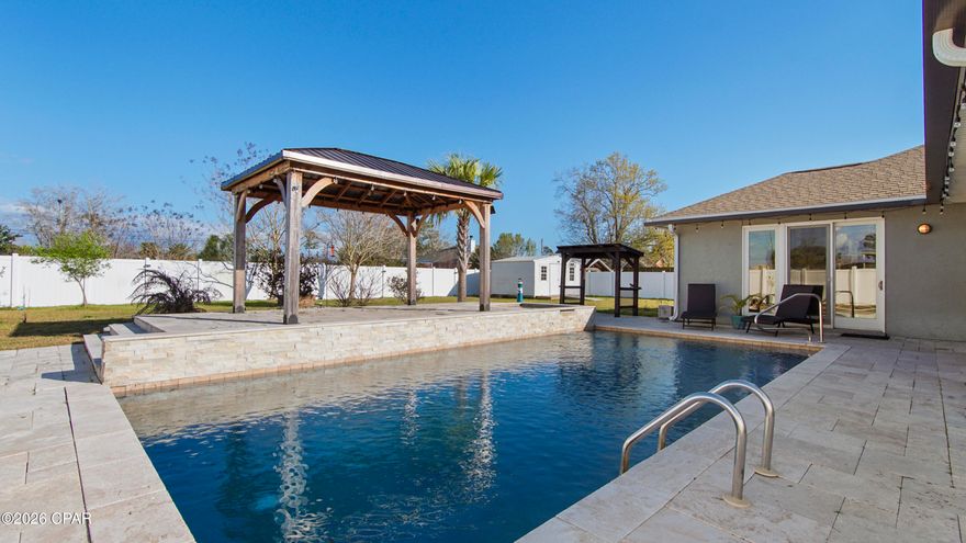 Just Reduced! Welcome to this stunning 3-bedroom, 2-bath home perfectly situated in the heart of Lynn Haven. Designed with both comfort and functionality in mind, this home features a thoughtfully designed floor plan with guest bedrooms located on the opposite side of the home from the spacious primary suite, offering privacy for family and visitors alike.
Enjoy multiple living areas including two separate living spaces, a formal dining room, and a cozy breakfast area--ideal for both everyday living and entertaining. The main living room is warm and inviting, highlighted by a beautiful gas fireplace that creates the perfect focal point and cozy gathering space.
Step outside to your own private oasis. The fully fenced backyard offers exceptional privacy and features a breathtaking pool and relaxing hot tub perfect for enjoying Florida living year-round.
Inside, you'll find tile flooring throughout the main living areas, plush carpet in the bedrooms, custom cabinetry, and beautiful granite countertops that elevate the kitchen and baths.
Conveniently located close to shopping, grocery stores, parks, and restaurants, this home offers both tranquility and easy access to everyday essentials.
This home truly combines comfort, style, location, and functionality in a highly desirable area. Don't miss your opportunity to make it yours!