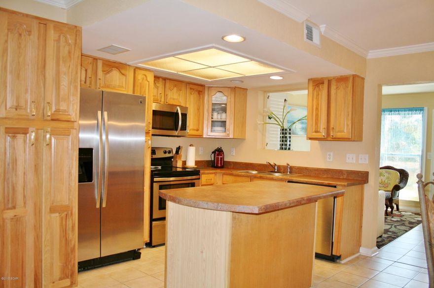 This is a very nice 2 BR with a Bonus Room Downstairs. If you are looking for that affordable Beach Getaway with several amenities CLOSE to the Beach... this is it! Association Dues only $410/qtr which means mowing your Lawn, Cable, & Trash included so no need to pay extra for those. There are 11 Pools, 4 Tennis Courts, Shuffleboard Courts, 18 hole Mini Golf, Conference Center, and a Clubhouse with a Gulf Front Pool and Snackbar. There is a 2 Pet minimum per unit with a 25 lb limit per pet. Age, SF, and dimensions are approximate... please verify if important.