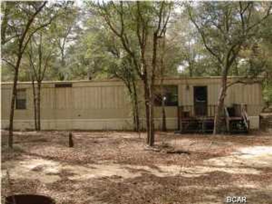 20 acres in the Fountain area with a 3BR/2BA mobile home on the property. There is a creek that runs through the back of the property. This would make a great weekend retreat/hunting lodge. All info is approx. and must be verified by Buyers if important.