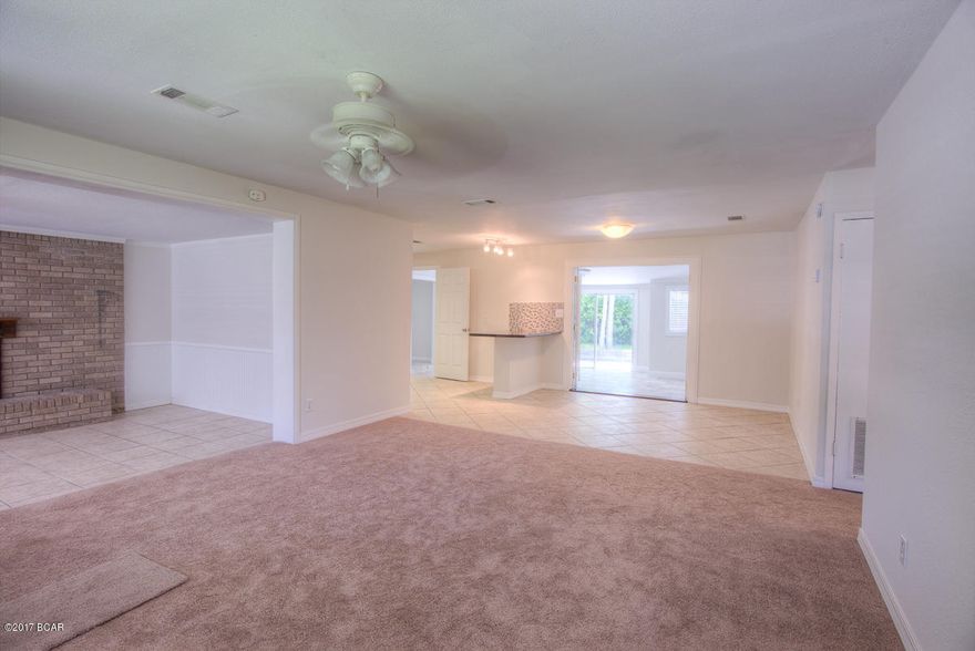 Home has just been completely remodeled with new roof, flooring, kitchen and more....located on nice large lot very centrally located.