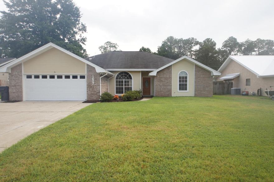 Come see this beautiful 4 bedroom 2 bath home with an in ground pool.  The upgraded kitchen with granite counters tops and glass back splash are astounding. Custom cabinets in the kitchen and master bath cherry wood, beautiful.  Master bathroom upgraded and remodeled with beautiful large custom shower.  Nice size bedrooms.  Beautiful hardwood floors in the living dining area and foyer.  I can't say enough about this home you must see it to believe.  A/C & heating system installed within the last 4 years. It has an Alarm System and the  hot water heater 2 year old. Convenient to Tyndall Air Force Base.  Don't miss out on this fabulous home.