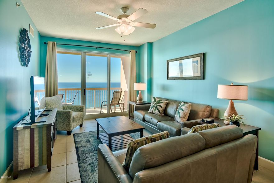 Incredible opportunity to own a fully furnished 2-bedroom, 2-bath gulf front unit with bunk room. This unit has been freshly painted throughout with a coastal blue color that matches the Gulf! This beautiful unit offers over $30,000 in updates including new luxury vinyl flooring in the bedrooms, new AC, flat screen TVs & stylish furniture and decor to name a few. Large windows and sliding doors allow in great natural light and stunning views of the Gulf of Mexico. The spacious balcony can be accessed from the living area or master bedroom and is the perfect place to relax, entertain and enjoy outdoor dining. Enjoy views of the Gulf of Mexico, shimmering white sand beaches and the expansive pool area. Exquisite details and features abound in this breathtaking unit that will not last long! Raised ceilings give the unit a spacious feel and the open floor plan allows gulf views from all the common areas and is great for entertaining. The open kitchen features ample cabinets, granite countertops and stainless steel appliances. The wrap-around granite breakfast bar is perfect for casual dining and socializing. The spacious, Gulf front master bedroom features direct balcony access, king size bed, flat screen TV, luxury vinyl flooring, double closets and an en-suite bathroom. Enjoy your morning cup of coffee out on the balcony while watching the sunrise over the gulf. The en-suite master bathroom offer tile floors, double vanity and shower/tub combo. The split bedroom floor plan allows the master bedroom extra privacy at the back of the unit, while the guest bedroom and bunk room are located at the front of the unit. The guest bedroom is plenty spacious and the bunk room is perfect for kids, both rooms feature luxury vinyl floors. The guest bathroom in centrally located and offers tiles floors and shower/tub combo. There is a laundry room with full size washer and dryer for added convenience. This unit's projected rental revenue is $33,000 and there is already a snowbird booked making this a fantastic rental investment or turn key unit to enjoy! 

Sunrise Beach has luxurious amenities including: 2 elevated Gulf front pools, one heated seasonally, 2 spas, large sun deck, spray park, owners lounge with full kitchen, gulf front exercise room, theater, plenty of underground parking, gulf front gas grills, 330 ft. of beautiful white sandy beachfront. An on-site seasonal beach service is available that rents beach chairs and umbrellas and a variety of water sports including jet skis, catamarans, paddle boards, banana boat rides and parasailing! Sunrise Beach is a deluxe 25-story gulf front complex with 275 units. It is located just east of Pier Park (approx. 1 mile) and only a short drive to Frank Brown Recreation Center and Gulf World marine park. Paradise awaits!