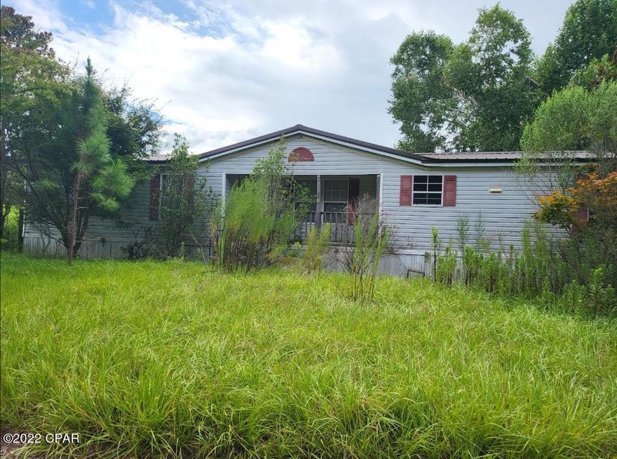 4 bedroom, 3 bath, Dbl wide mobile home with an addition on 1.1 acres, includes a well, septic, 5yr young metal roof and a 4yr old a/c!! Updates and repairs are needed!! Price based on the condition of the property! Seller will not make any repairs prior to close. Property being sold as-is!! Schedule a showing today!!