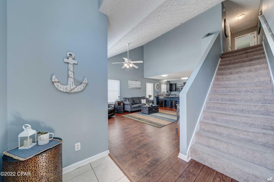 ''CURRENTLY UNDER CONTRACT SELLERS EXCEPTING BACK UP OFFERS'' Beautiful Large 3 bed 2.5 bath home close to beach. Main Bedroom down stairs leads to outside patio & has large bath & closet .  Living room has cathedral ceilings & an a open kitchen , HUGE pantry that could be used as lock out room for Short term rentals. Large  Laundry is off the living room as well and a half bath for your guests to use. Upstairs is two more Large & roomy bedrooms, walk in closet  with another full bath. New HVAC with coastal condenser for the beach installed last year with 10 year warranty . This is a perfect home or Rental unit short & long term rentals allowed  Last year rev. from STR all platforms about  $40,000.