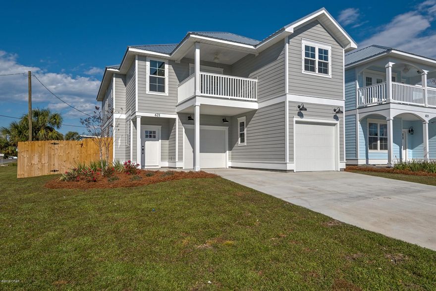 THIS HOME IS MAGNIFICENT! Less than 400 steps to the beach! Home features include the perfect beach location, lush landscaping, 2 separate garages & a maintenance free yard. Step inside & WOW! You will LOVE it! The ultimate chef's kitchen, stainless appliances, corian tops, custom tile, crown & elegant lighting throughout, even shiplap accents! Four spacious bedrooms, lots of storage & each bath is more beautiful than the next! The Master Suite offers a magnificent WATERVIEW from your balcony! The master bath is truly INCREDIBLE! The custom tile is simply stunning & the soaking tub is calling your name! The builder out did himself on this one. Home includes a 10 YEAR WARRANTY!  Plans available for a pool as well. This is the PERFECT opportunity to own a custom built beach home today!!!