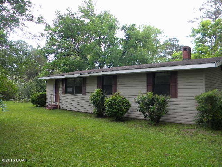 WOW.  You have got to see this cute updated home on the outskirts of town with newer kitchen cabinets and counter tops, large bathroom with separate makeup area for mom, fenced yard for the kids to safely play, almost 1/5 an acre, appears to have newer flooring and paint throughout home.  Would make a great retirement home or newly married couple to start out.  Don't miss this one.  Call today to see.