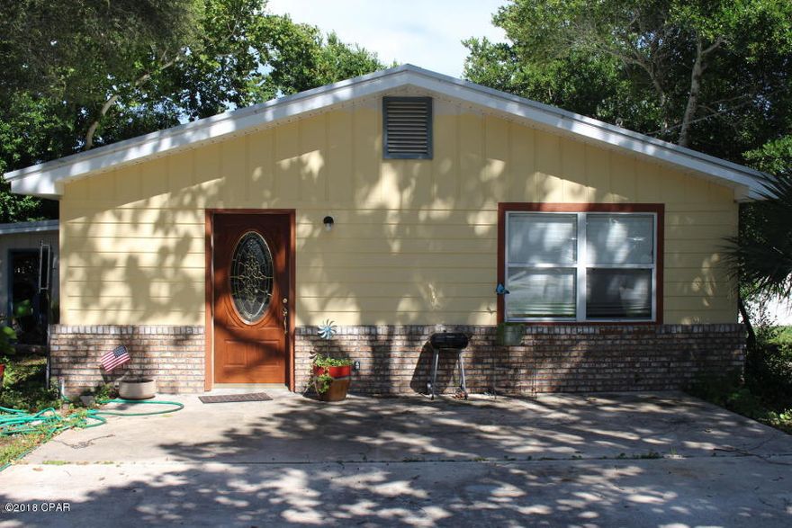 Newly remodeled home with High quality stainless steel Maytag appliances refrigerator with ice and water in the door. Glass top stove. In new cabinets glass black backsplash, Granite countertops, ceramic tile flooring. The roof is 3 years old!! Ceramic tile and carpet, Close to the beach and Pier Park!