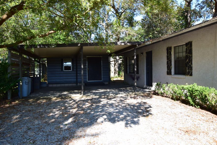 Waterfront home on almost 1 acre of land. This 2 bedroom/2 bath home is move in ready and has many possibilities. It was loved for many years and now needs a new owner to call it theirs. Spacious open floor plan with large additional Den with fireplace for family gatherings, Covered carport, storage shed, boat dock and lots of trees. A new roof is being installed.