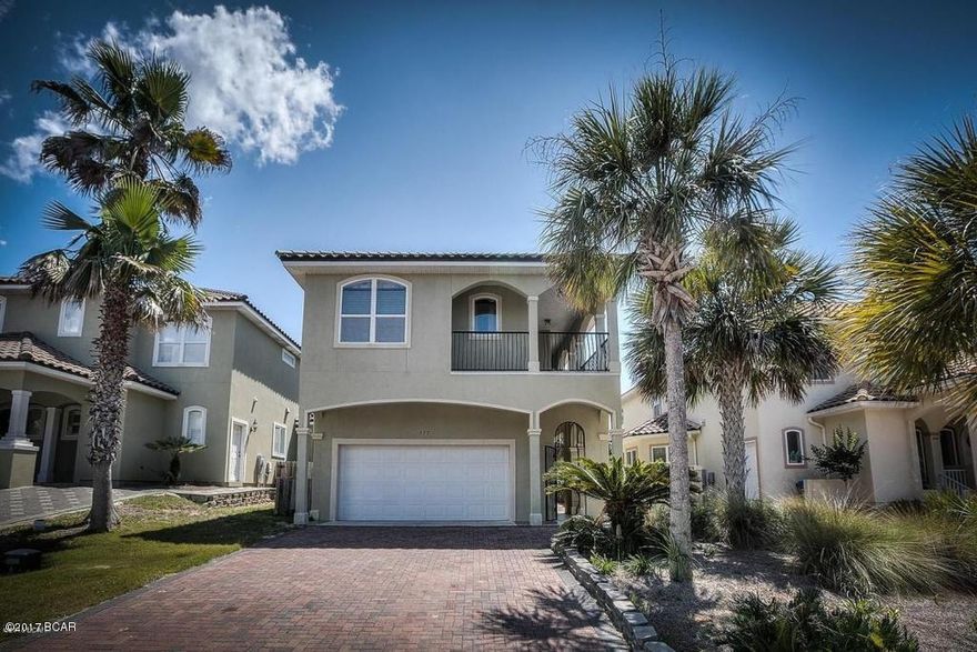 What a great opportunity for a beach home in one of the few exclusive gated communities on the far west end of Panama City Beach. La Valencia offers wonderful amenities such as two pools ,one of which is Gulf Front. tennis and owner's club house. The community has a Mediterranean vibe and is loaded with beautiful homes including this one!! This home has wonderful living space both inside and out. There are balconies, porches and a walled  courtyard adding to the charm of this home. This property is a wonderful investment opportunity and comes totally furnished. Just bring your swimsuit or start renting the home right away, it is rental ready. Our beach inventory is getting very low and opportunities in the community are rather rare.Come check this out. Don't wait too long. It may not last.
