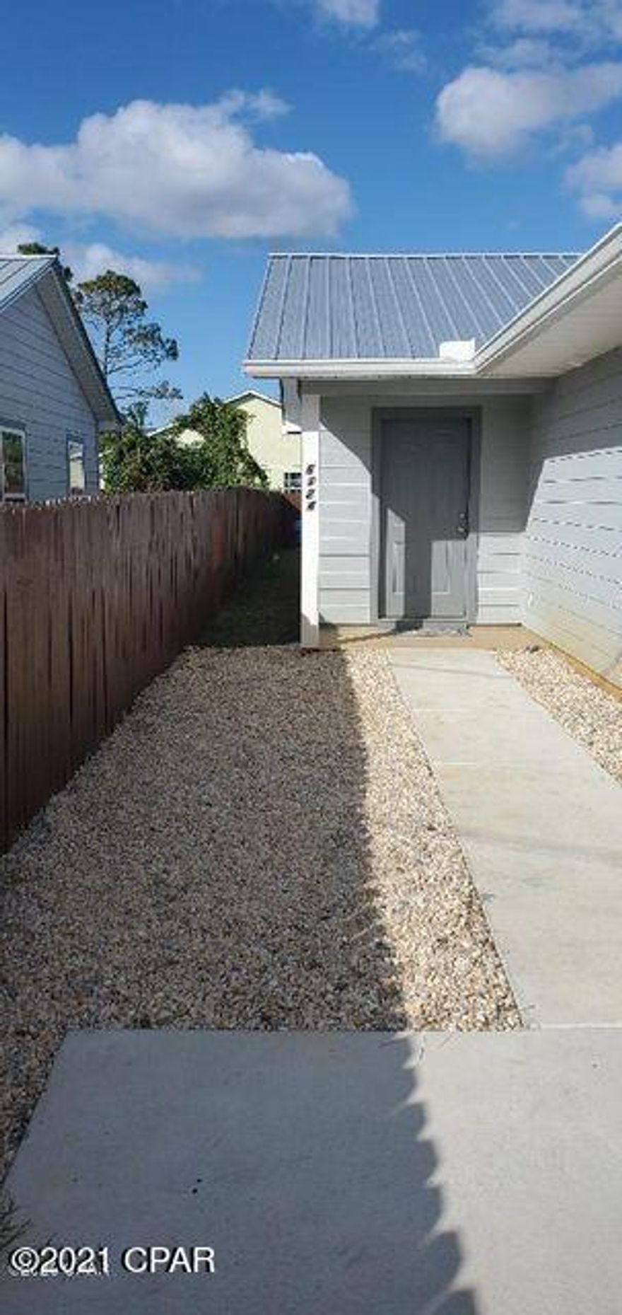 This Property Currently Under  Contract and we are taking Backup Offers. This is a nice 2 BR 2 Bath Duplex with ceramic tile throughout, metal roof, central H/A and much more.  Currently rented for 1,100.00 per month but could bring more rent when lease is up. Tenant will be moving by July 1, 2021.  There is a lift stations and an irrigation well for the lawns that is shared by all (4) four units.  The approximate share for the electricity is $100.00 per quarter.  Any repairs on the lift station and irrigation pump would be split between all (4) four of the units. the $100.00 per Quarter is for the Irrigation Pump's Electricity for irrigation of the grass and the Grinder Pump for the Lift station.  The Units are for sale and the Parking areas and lawns are common shared areas.