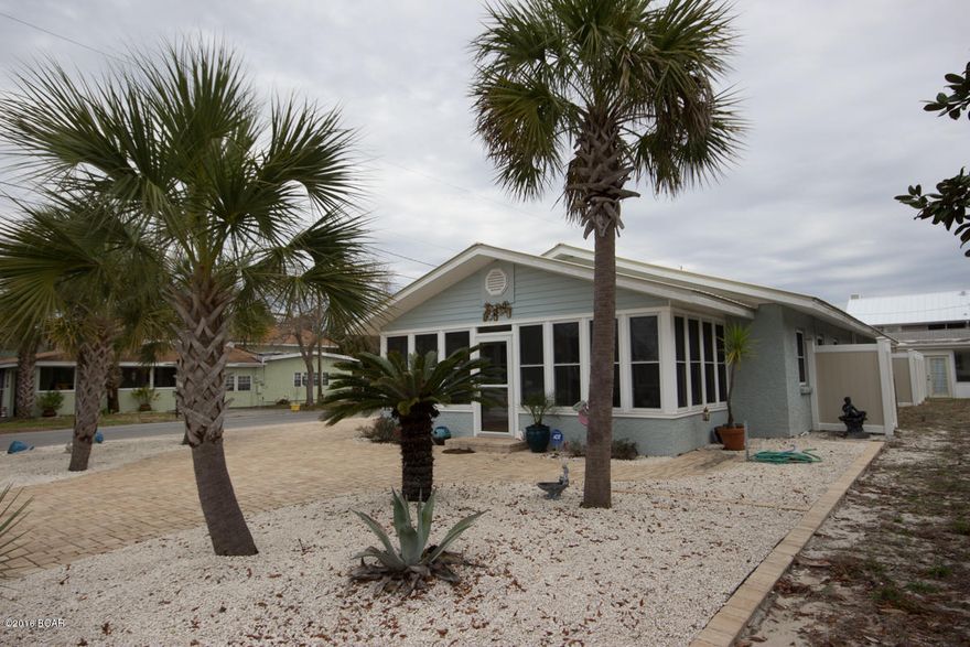 This home was completely re-built and upgraded in 2012. MANY up grades and

Extras. It is 3  bed 2 1/2 bath, but has an office/bonus room that they use as guest sleeping. All (porcelain )tile, Granite, Stainless(kitchen Aid appliances) Complete new (Trane) HVAC-Electrical and Plumbing. This home has a wonderful ''L'' shaped Pool complete with ''Dancing water'' jets and Light show. Low maintenance yard and Vinyl privacy fence. There is also a Sun Room (completely glassed in) 10x22 (220 sq. ft. which is NOT included in the Total Sq. footage !) Nice corner lot so Parking is Great. 2 Blocks to Bid a Wee Private entrance beach. Gulf views from your Front yard !Outdoor shower, 1/2 bath off of Pool, Beautiful Summer Kitchen, Hurricane clips added ! Extra insulation, Metal Roof with 50 year Kyn finish, Paver Driveway, Travertine Pool Decking, Outdoor Kitchen with Alfresco gas grill and cook top, Tank less Water Heater, Irrigation system, Vinyl eves, There is an estimate of $600.00 to run the Heat and Air to the Sunroom !
Please ask us or your Realtor for the Virtual Tour address.