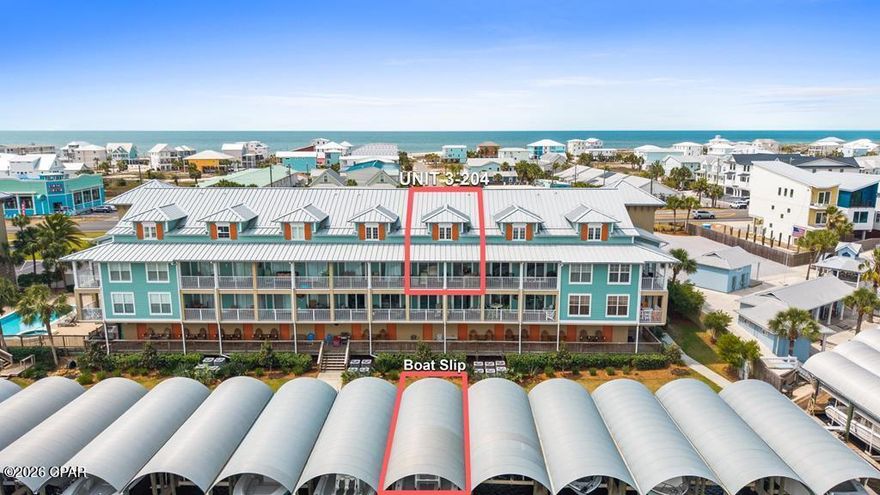CALLING ALL BOATERS! Welcome to West End Harbor B3-204, one of Mexico Beach's premier canal-front communities and the only complex in the area capable of accommodating boats 37 feet and longer. This newly painted 2BR/2BA condo offers 1,791 square feet of comfortable living space, with an open-concept living, kitchen, and dining area and a covered balcony overlooking the canal. Your private boat slip comes equipped with a brand-new 24,000 lb lift, big enough to handle a 42' Freeman, and is just steps from your back door with direct Gulf access, making it as easy as it gets to get out on the water and come home to your own slip. When beach days call, the nearest access is just a short golf cart ride away. The unit also includes a dedicated rod room and tackle storage, two covered parking spaces, and access to the community pool and hot tub. Whether you are a serious offshore angler, a weekend boater, or simply looking for a low-maintenance property with strong rental potential, this condo checks every box. Call today!