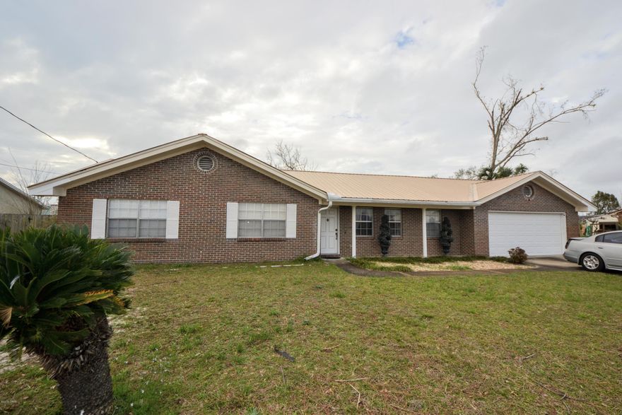 ''CURRENTLY UNDER CONTRACT, SELLER ACCEPTING BACKUP OFFERS'' For Sale – Great Neighborhood, 3 Bedroom 2 Bath Mostly Brick Home, Metal Roof is 6 Years Old, Owner Says No Leaks Lawn Well & Pump, Large Kitchen with Plenty of Counter & Cabinet Space.  Over-sized 2 Car Garage, Fireplace, Large Master Bedroom with Master Bath, Separate Dinning Area and a huge Lot. Located in Flood Zone X. Seller has done some Hurricane Repairs.  Home is Livable,  Priced To Sell.  Call your Agent today to Schedule a Showing.