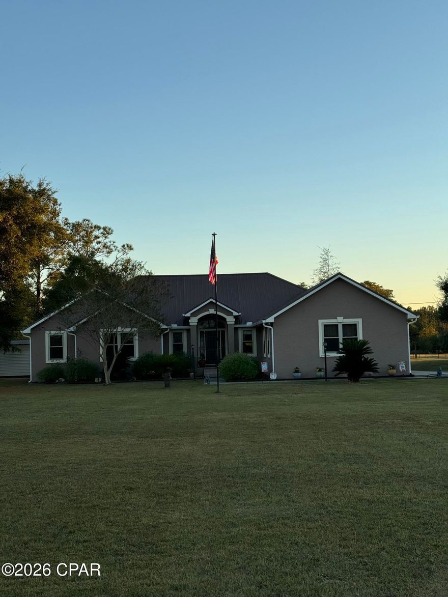 Beautiful Country Home on 5 Acres - Built in 2022!

Enjoy peaceful country living in this beautiful 3   bedroom, 2.5-bath stucco home with an office space that could  another bedroom built in 2002, situated on 5 acres in Fountain, FL. This move-in-ready property offers the perfect blend of modern construction, space, and functionality for those looking for privacy and room to spread out.

The home features a durable metal roof and spacious living areas designed for comfortable everyday living. The property is enhanced with numerous fruit trees, adding charm and the opportunity for your own homegrown harvest.

For those needing workspace, storage, or room for equipment, this property delivers with multiple outbuildings and pole barns, including:

36x40 Pole Barn located behind the home

22x24 Pole Barn on the side of the house (currently housing a tractor)

16x36 Pole Barn with RV hookup and 50-amp power

20x24 powered workshop/shed at the rear of the property

16x16 storage shed near the home

The home also includes valuable upgrades such as a 23 KW whole-home generator located outside and a whole-home dehumidifier system installed in the attic, helping maintain comfort and protect the home year-round.

With plenty of space for equipment, hobbies, animals, or recreational vehicles, this property offers endless possibilities for country living while still providing modern convenience.

Move-in ready and priced to sell -- don't miss this opportunity to own your own slice of Florida country living!