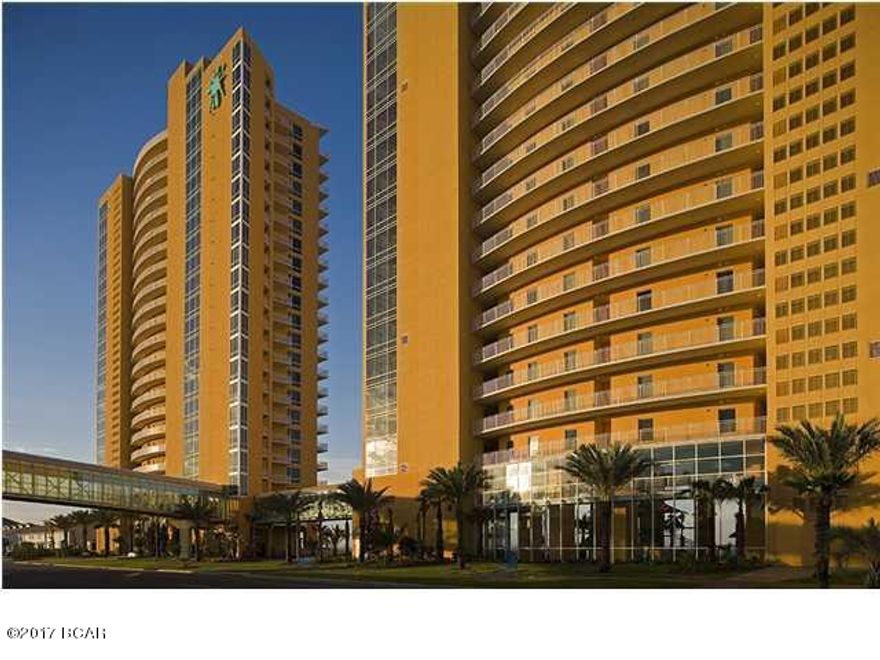 Come see the views from this fantastic 8th floor one bedroom condominium. Open spacious living area leads to your Gulf front Balcony where you or your guests can take in the spectacular view of the beautiful white sand beach and the emerald waters of the Gulf of Mexico! With tile, wood fooring & cabinetry throughtout this unit can easily sleep 6 guests comfortable, with a spacious Master Suite plus hall bunks and sleeper sofa. Some of the other features foung here are; granite counter tops in the kitchen and bathrooms, tile, wood flooring and cabinetry throughout.Splash offers amazing resort style amenities including: waterpark, including a kids' pool park with waterslides, interactive water toys, a lazy river ride, ''Dive-In'' movie theater, arcade, fitness center, a pool and Jacuzzi just for the adults and a poolside bar and grill. Alvin's Island beach apparel & surf
shop located just across the street, along with the convered parking garage. Just minutes to Pier Park and all the best restaurants, shops and entertainment it has to offer. Come see for yourself! Please note all dimenstions are approximate and should beverified if important.