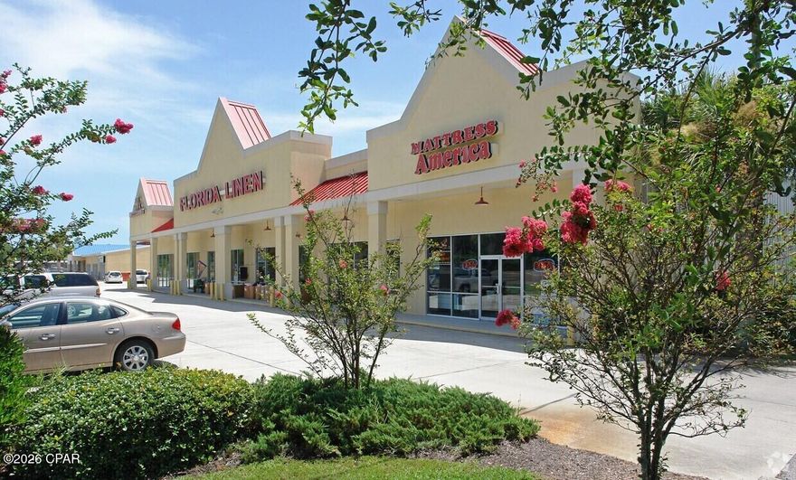 Position your business or investment portfolio for success with this exceptional commercial opportunity located directly on highly traveled Panama City Beach Parkway. With an impressive traffic count of approximately 52,000 vehicles per day, this property delivers outstanding visibility and consistent exposure along one of the area's most active corridors.

The building offers approximately 15,550 square feet of solid steel construction with a durable metal roof, designed for long-term performance and low maintenance. Its flexible layout allows for easy subdivision into multiple units, creating a prime opportunity for multi-tenant occupancy and diversified income streams.

Investors will appreciate the strong income-producing potential, with the ability to lease multiple suites to a mix of retail, office, or service-based tenants. The additional restaurant space, complete with a vented hood, provides a valuable opportunity to attract a high-demand food and beverage tenant--further enhancing rental income and overall property value.

The all-glass storefront maximizes visibility and curb appeal, while 26 on-site parking spaces support tenant and customer convenience. A monument sign with a digital display board offers premium advertising exposure, adding further value for tenants and increasing lease desirability.

Whether you're seeking a high-visibility location for your own business, a multi-tenant investment with strong cash flow potential, or a value-add opportunity in a rapidly growing market, this property offers the versatility and upside to deliver long-term returns.