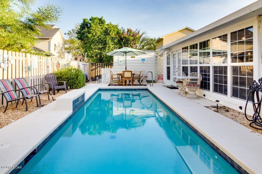 This may be one of the cutest cottages in Panama City Beach! The new owner has it decorated so that you walk in and know you are on vacation! The home is over 1900 sq ft (incorrect in in PA site) and with 4 bedrooms and 3 baths, large enough to accommodate all of your family on vacation. And here is the great part..it has a pool!!! Tiled throughout and low maintenance landscaping makes this home your perfect beach get away! Priced 2000K below recent appraised value!